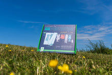Load image into Gallery viewer, PeggyRain clothesline. Irish weather. UK weather. Automated washing line protects your washing from rain. PeggyRain protects your washing when it rains. PeggyRain keeps your washing dry from the rain.