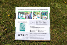 Load image into Gallery viewer, PeggyRain clothesline. Irish weather. UK weather. Automated washing line protects your washing from rain. PeggyRain protects your washing when it rains. PeggyRain keeps your washing dry from the rain.
