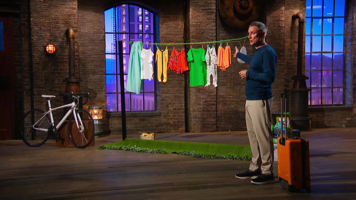 See PeggyRain on Dragons den Colin O' Brien demonstrating his washing line that covers your clothes when it rains. BBC Dragons Den 2024 Series 21 Episode 1 Colin O' Brien with ROLLAER roler case suitcase and bicycle alarm Touker Suley Man Peter Jones Steven Bartlet Dragons Den new series Thursday 4 January 2024 peggyrain www.peggyrain.com www.rollaer.com